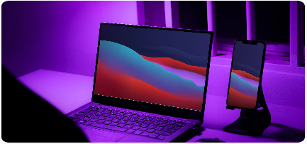 A laptop and a mobile with the same wallpaper