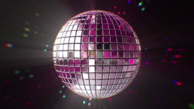 A silver disco ball reflecting light with black background and lasers