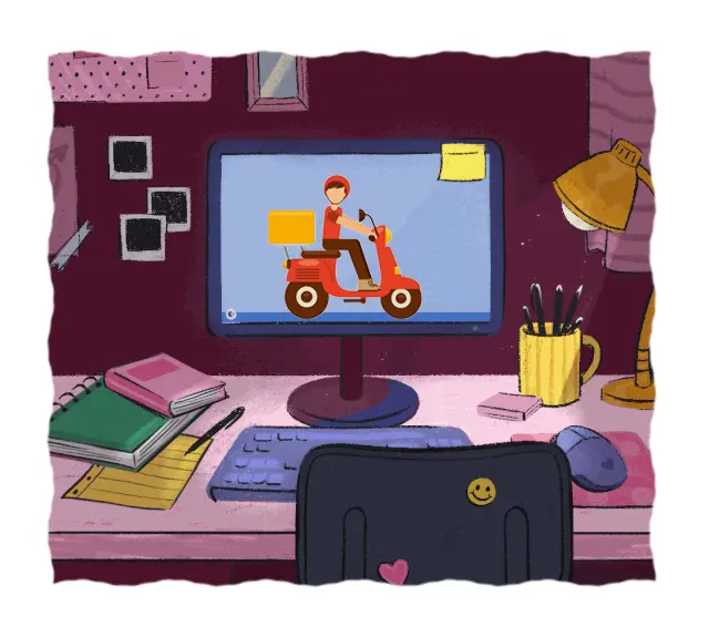 A desk with computer monitor and other office stationary and a food delivery driver on a motor bike on the computer monitor